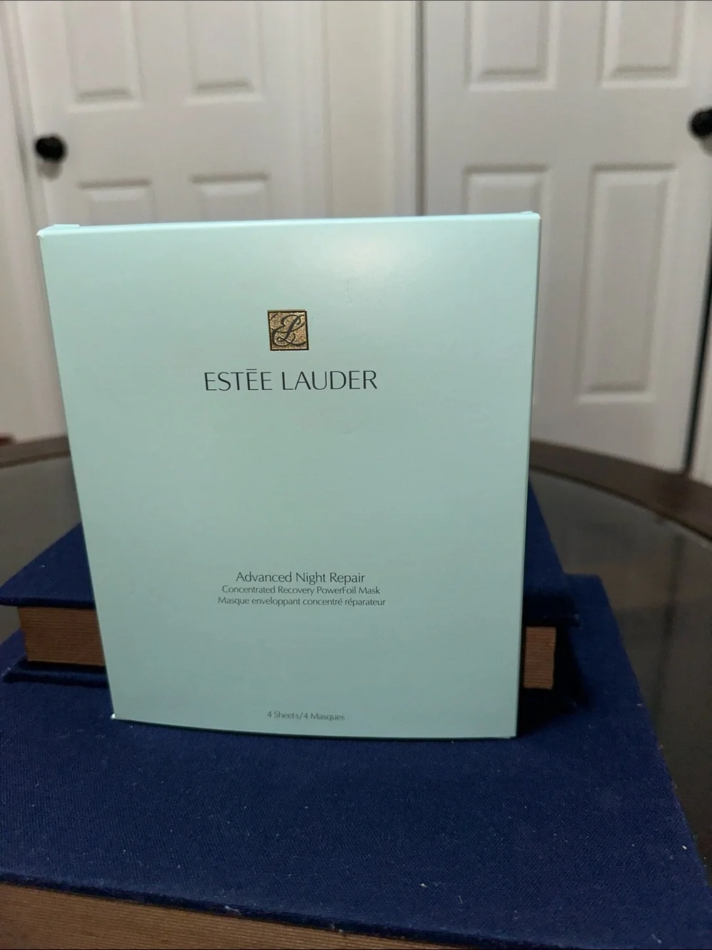 Estee Lauder Advanced Night Repair Mask - light aqua with gold logo